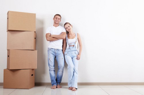Furniture pick-up team removing bulky items from a Paddington apartment building