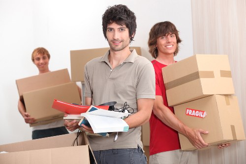 Team managing stairs and access during a central London apartment removal