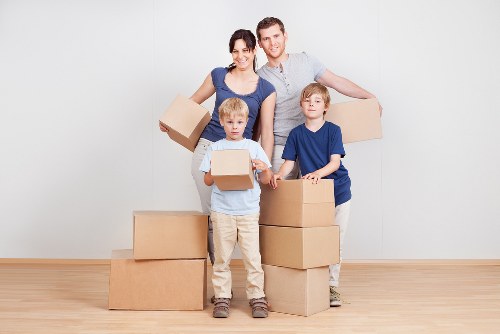 Professional movers assisting with boxes in Paddington