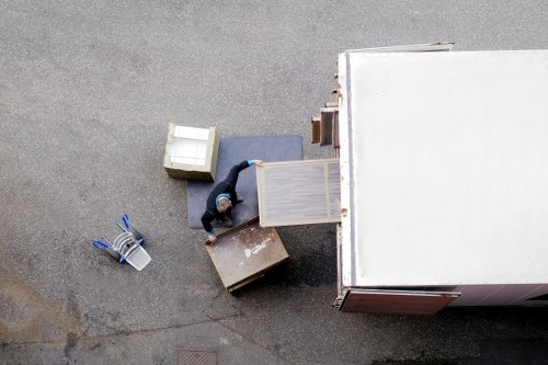 Team member lifting a box with correct posture