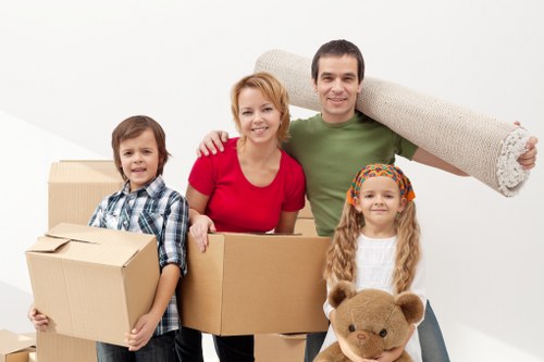 Careful packing of fragile items for flat removals in Paddington